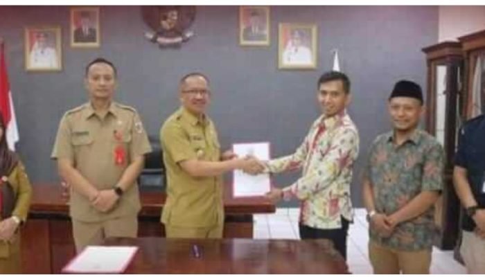 Pemkot Kotamobagu Serahkan Hibah Rp22,5 Miliar ke KPU