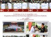 PJ Wali Kota Asripan Nani Mengukuhkan Paskibraka Kota Kotamobagu Tahun 2023 menjadi Purna Paskibraka.