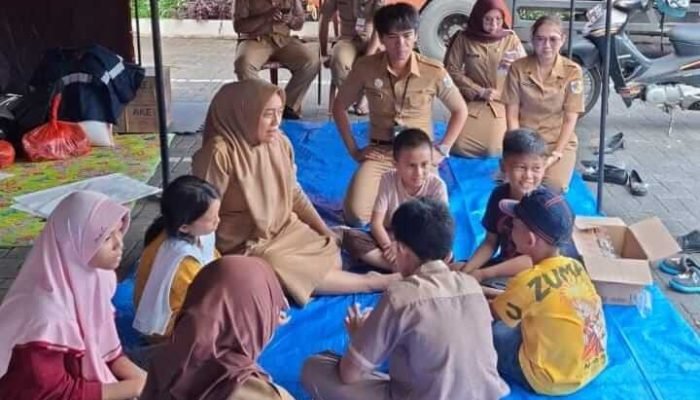 DP3A Kotamobagu Lakukan Trauma Healing Bagi Anak-Anak Terdampak Musibah.