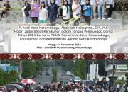 Pj. Wali Kota Kotamobagu Hadiri Jalan Sehat Kerukunan untuk Pemilukada Damai 2024.