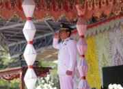 Wali Kota Kotamobagu, dr Weny Gaib SpM memimpin upacara peringatan HUT Kemerdekaan RI ke-80 di Alun-alun Boki Hotinimbang, Minggu (17/8/2025). Foto/Kominfo Kotamobagu.