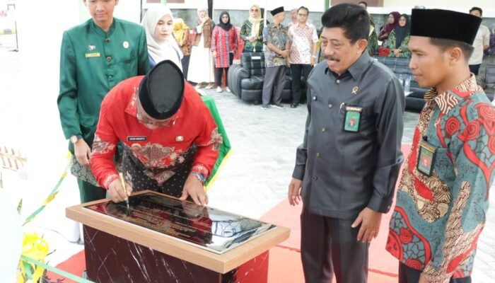 Bupati Boltim Resmikan Lapangan Tenis Pengadilan Agama Tutuyan 